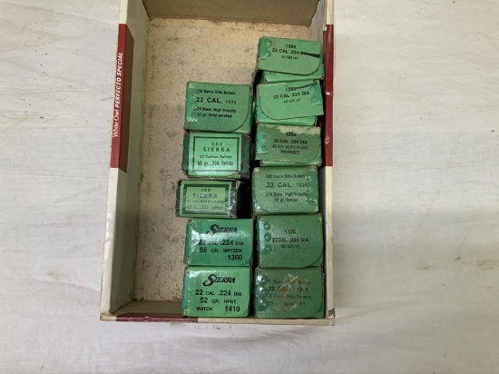 3 full and 8 partial boxes of Sierra 22 cal bullets,