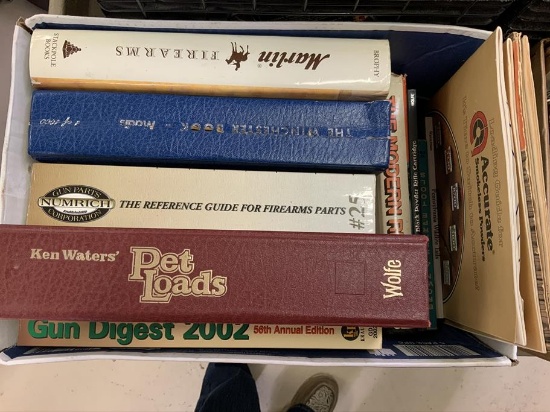 9 books and a few magazines, Gun Digest 2002, Pets Loads, Nurmich parts guide, The Winchester Book 1
