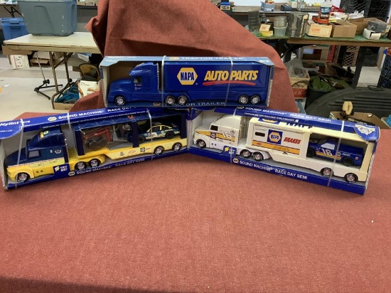 3 NAPA toy trucks - 2 are sound machine race day semi