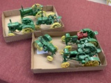 6 die cast John Deere toy tractors with metal wheels,