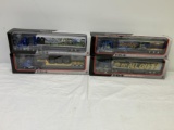 4 new in the box 1:64 die cast metal replica tractor trailers -
