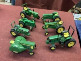 7 John Deere Die cast toy tractors - all toys have been played