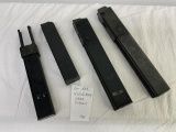 4 stick magazines, 2 9mm with a loader and 2 45 auto stick mags