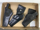 2 boxes of 10 pcs - 3 holsters, handcuffs, 2 handcuff holders,