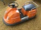 vintage child's coin operated bumper car in pink