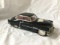2 metal model cars -both