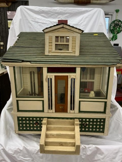 vintage child's model cottage with some interior