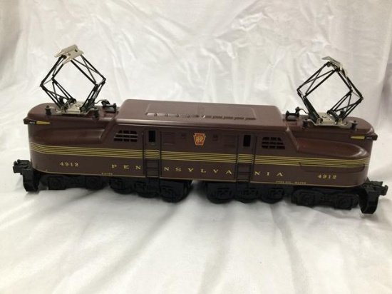 lionel prr #4912 engine train set with 4 passenger cars