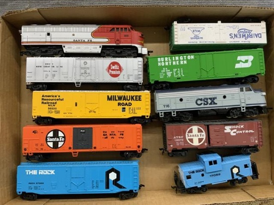 10 piece HO scale trains. 2 engines, 8 cars & caboose