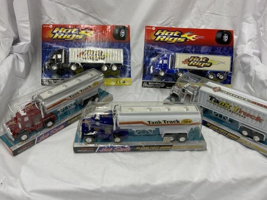5 sealed tractor trailer trucks