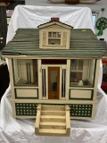 vintage child's model cottage with some interior