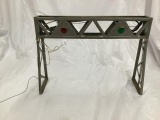 train signal tower/overhard signal and pipes