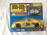 3 nascar framed pictures/m&m car & license plate