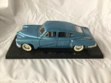 road legends 1948 tucker model car on display stand