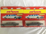 2 majorette limousines on card - both