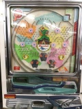 vintage pachinko baseball game with bag of steel balls
