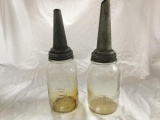 2 vintage master oil spouts on atlass mason jars -both