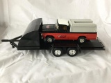 ertyl diecast auto palace truck bank on an ideal truck