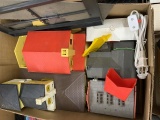 box full of plasticville houses and town buildings