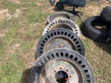 (4) Caterpillar Wheels and Tires