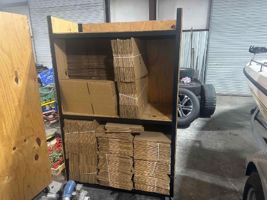Rolling Wooden Rack with Unused Cardboard Boxes