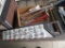 Lot of plumbing tools and sign