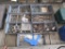 Lot with 7 containers with drill bits, car parts, and zipties