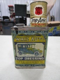 Lot including Whiz Auto top dressing can and Phillips 66 bank