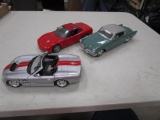 Lot of 3 - 1/18 scale cars. No boxes