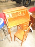 Antique childs roll top desk and chair. 24 in. wide
