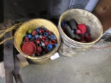 2 Pails of Plastic Plugs