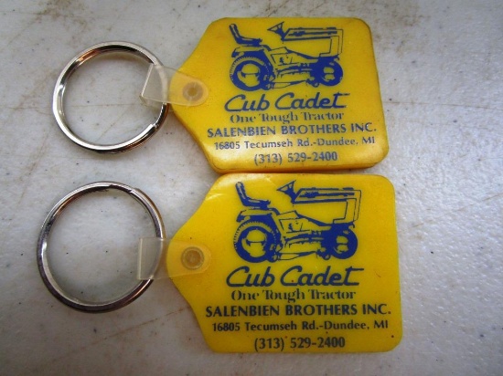 156-41 Lot of (2) Vintage Salenbien Bros. Inc. Cub Cadet Key Chains
