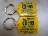 156-41 Lot of (2) Vintage Salenbien Bros. Inc. Cub Cadet Key Chains