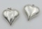 TWO LARGE STERLING SILVER HEART PENDANTS TWO LARGE STERLING SILVER HEART PENDANTS. 10 GRAMS EACH. TO
