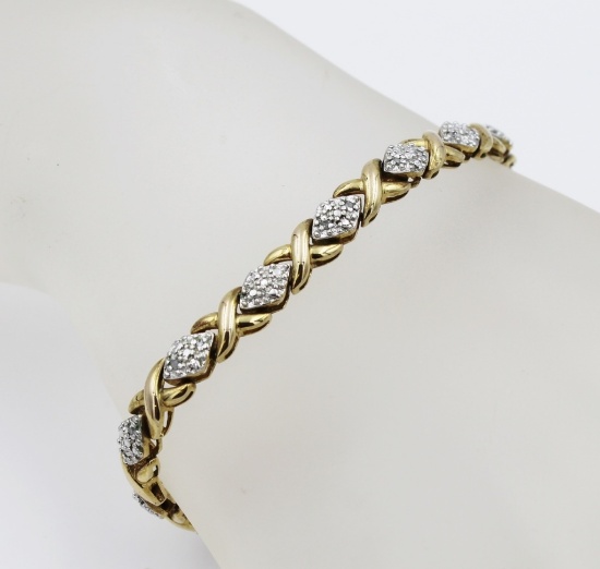 GOLD TONED AND DIAMOND STERLING SILVER BRACELET GOLD TONED AND DIAMONDS TERLINGSILVER BRACELET. 8" L