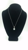 STERLING SILVER NECKLACE WITH REVERSIBLE PENDANT STERLING SILVER NECKLACE WITH REVERSIBLE PENDANT. C