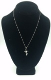 STERLING SILVER CROSS NECKLACE STERLING SILVER CROSS NECKLACE WITH CZ IN THE CENTER. 3.3 GRAMS. PRE-
