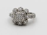 JUDITH RIPKA .925 RING WITH CZ'S. JUDITH RIPKA STERLING SILVER RING WITH CZ'S. SIZE 6.5. ESTIMATE: $