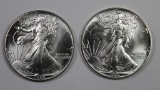 TWO 1986 AMERICAN SILVER EAGLES