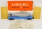 Unrun Lionel postwar O gauge 3830 flat car with operating submarine in OB