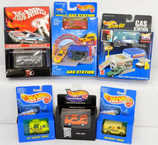 Six Hot Wheels boxed cars and Sto & Go sets