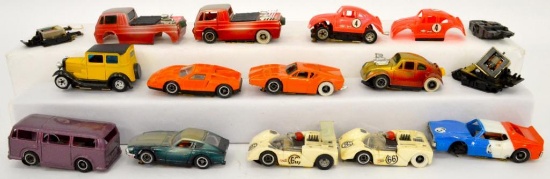 Group of Tyco pro HO slot cars and extra chassis parts