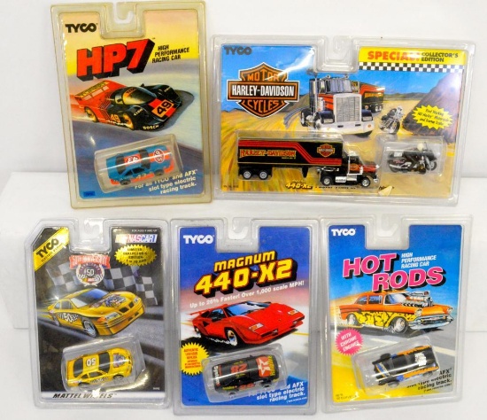 Small group of Tyco HO slot cars mint on blister cards