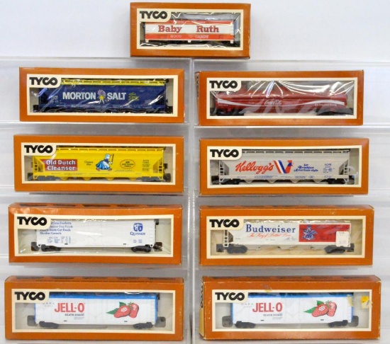 Nine Tyco HO brown box billboard freight cars in original boxes