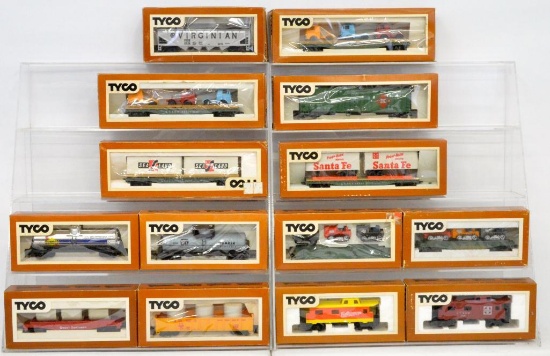 Fourteen Tyco brown box HO freight cars in original boxes