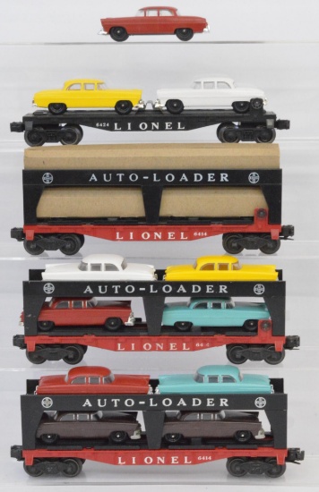 Three Lionel postwar O gauge 6414 auto loader and 6424 with cars