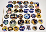 Thirty-seven NASA patches with mostly Apollo Missions