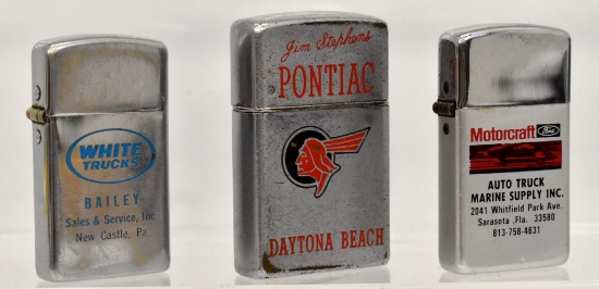 Group of vintage advertising cigarette lighters