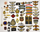 Large Grouping of British and Canadian Military Patches Pins and Wings