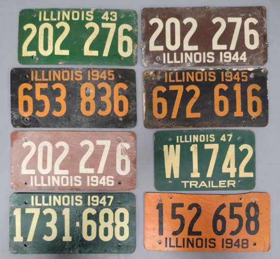 Group of eight 1943-1948 Illinois soybean fiber license plates